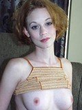 Pale skinned amateur Justine Joli takes off her blue jeans and white thong panties