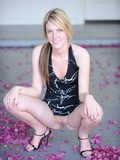 Naughty blonde Riley Ray shows her private parts without taking off her black dress