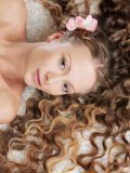 Glamorous curly haired babe Frances A demonstrates her hot shaved pussy
