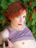 Flat chested redhead girl Indiana Littlemutt with neatly trimmed bush poses naked