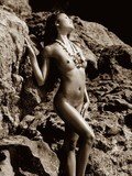 Classy boobs and firm ass courtesy of glamorous asian beach model Charmane Star