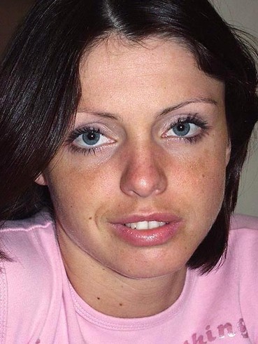 Brunette girl Angelina Croft removes her black panties and shows her pink on king size bed