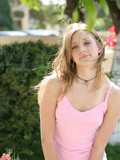 blonde girl bronzed outdoors short skirt Lisa Nubiles