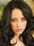Breathtaking leggy brunette beauty Paizley Adams takes off her blue jean mini-skirt