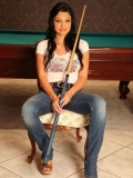 Beautiful Aletta Ocean in jeans and t-shirt makes her big eyes on you with billard cue in her hands