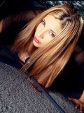 Sexy dressed babe Jelena Jensen in fishnets shows her heavy tits and snatch