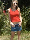 blonde blue shorts posing outdoors red top teen Nadia Taylor