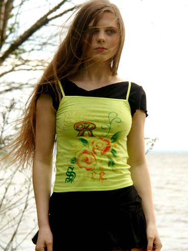 Cute red haired teen Carmen Nubiles strips outdoors and hotly poses by the tree.
