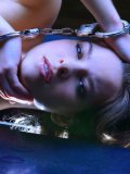 Flexible skinny european girl Kim Nubiles is totally naked in handcuffs