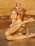 Skinny long legged girl Bunny poses nude on the wild beach showing it all