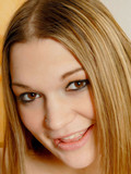 big boobs black panties black skirt blue top posing on the bed teen Cassandra Calogera