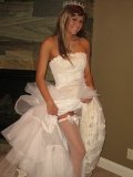 Melissa Midwest dressed in wedding dress shows and fingers her sexy hairless pussy