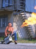 Huge breasted brunette Veronica Zemanova in blue jeans loves to play with fire