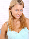 blonde pants posing on sofa skirt teen Ginger Lee