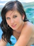 Brunette girl Tasha FTV with blue eyes and bald pussy masturbates and poses naked outside
