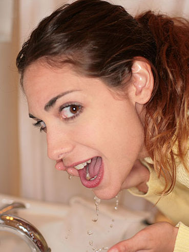 The fresh semen is filling the beautiful mouth of gorgeous chick Katie Allure