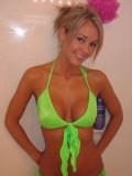 Round titted Foxy Jacky takes off her green bikini and gives blowjob in the bathroom